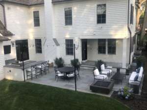 Backyard-Finished-Patio-Full-Outdoor-Kitchen-black_white_modern_full-view-DeShayes-Residential-Resort-Design