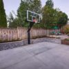 backyard-basketball-court-with-hardscaping-wood-planters-lighting-DeShayes-Dream-Courts