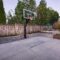 backyard-basketball-court-with-hardscaping-wood-planters-lighting-DeShayes-Dream-Courts